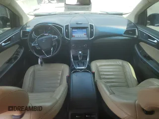 2016 Ford Edge SEL z VIN 2FMPK3J8XGBB17409, wystawiony jako Copart lot #57434045 z przebiegiem 139 645 mil mil oraz Szkody całkowita. Historia ofert i sprzedaży dostępna na DreamBid. Obrazek 8.