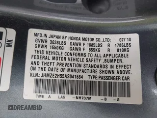 2010 Honda Insight LX with VIN JHMZE2H55AS041684, listed as a IAAI auction lot 42222564 with 296,830 mi miles and . Bid and sale history available at DreamBid. Image 9.