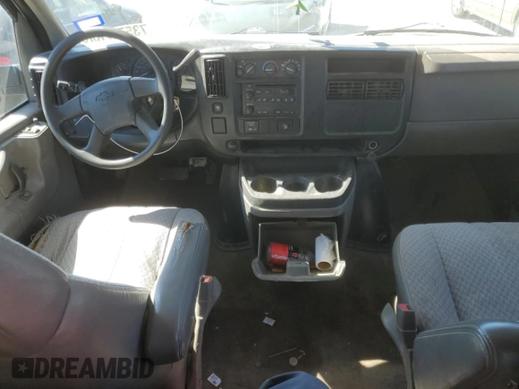 2005 Chevrolet Express Passenger with VIN 1GAHG39U051232615, listed as a Copart auction lot 73574264 with 207,303 mi miles and Salvage title. Bid and sale history available at DreamBid. Image 8.