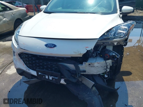 2020 Ford Escape Titanium z VIN 1FMCU9J90LUA39747, wystawiony jako IAAI lot #42369890 z przebiegiem 31 425 mil mil oraz . Historia ofert i sprzedaży dostępna na DreamBid. Obrazek 17.