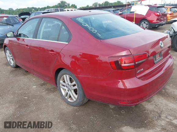2017 Volkswagen Jetta S z VIN 3VW2B7AJ2HM314001, wystawiony jako IAAI lot #42602453 z przebiegiem 88 464 mil mil oraz . Historia ofert i sprzedaży dostępna na DreamBid. Obrazek 3.