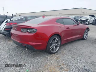 2021 Chevrolet Camaro 1LT with VIN 1G1FB1RX9M0107010, listed as a IAAI auction lot 42629591 with 65,450 mi miles and . Bid and sale history available at DreamBid. Image 4.