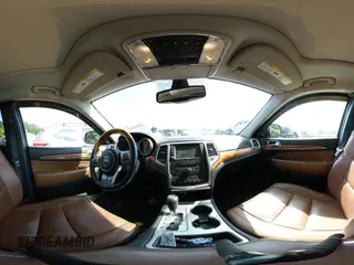 2013 Jeep Grand Cherokee Overland with VIN 1C4RJECT3DC526005, listed as a IAAI auction lot 42064151 with 112,777 mi miles and . Bid and sale history available at DreamBid. Image 18.