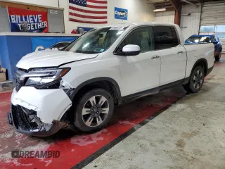 2017 Honda Ridgeline RTL-E z VIN 5FPYK3F72HB002890, wystawiony jako Copart lot #57699735 z przebiegiem 128 813 mil mil oraz Szkoda całkowita • Salvage title. Historia ofert i sprzedaży dostępna na DreamBid. Obrazek 1.