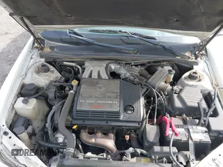 2003 Toyota Avalon XL with VIN 4T1BF28B73U321678, listed as a IAAI auction lot 42083979 with 283,606 mi miles and . Bid and sale history available at carsss.com. Image 10.