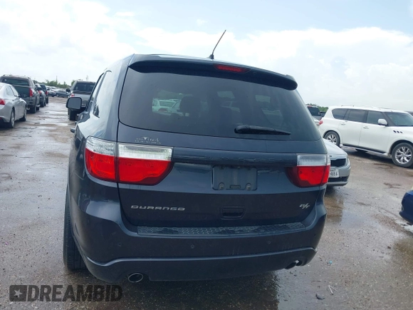 2013 Dodge Durango R/T with VIN 1C4SDHCT6DC658802, listed as a IAAI auction lot 42510985 with 67,653 mi miles and . Bid and sale history available at DreamBid. Image 15.