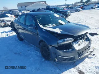 2009 Volkswagen Jetta S z VIN 3VWJZ71K49M124833, wystawiony jako IAAI lot #41391515 z przebiegiem 132 158 mil mil oraz . Historia ofert i sprzedaży dostępna na DreamBid. Obrazek 1.