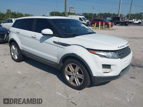 2015 Land Rover Range Rover Evoque Pure Premium z VIN SALVR2BG0FH964683, wystawiony jako IAAI lot #42016766 z przebiegiem 94 942 mil mil oraz . Historia ofert i sprzedaży dostępna na DreamBid. Obrazek 1.