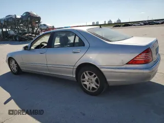 2003 Mercedes-Benz S-Class 4.3L with VIN WDBNG70J03A339034, listed as a Copart auction lot 70583504 with 104,849 mi miles and Salvage Title. Bid and sale history available at carsss.com. Image 2.