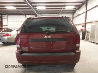 2007 Jeep Grand Cherokee Laredo with VIN 1J8GR48K97C631672, listed as a IAAI auction lot 41520054 with 231,576 mi miles. Bid and sale history available at carsss.com. Image 16.