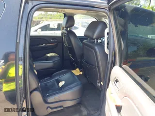 2011 Chevrolet Suburban LTZ with VIN 1GNSCKE01BR275919, listed as a IAAI auction lot 42038399 with 247,841 mi miles. Bid and sale history available at carsss.com. Image 8.