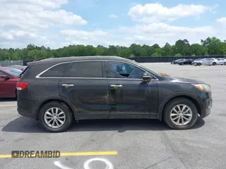 2016 Kia Sorento LX with VIN 5XYPG4A3XGG083872, listed as a IAAI auction lot 42093148 with 98,056 mi miles. Bid and sale history available at carsss.com. Image 13.