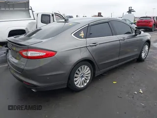 2013 Ford Fusion Titanium with VIN 3FA6P0SUXDR332271, listed as a IAAI auction lot 42174434 with 201,404 mi miles and . Bid and sale history available at DreamBid. Image 4.