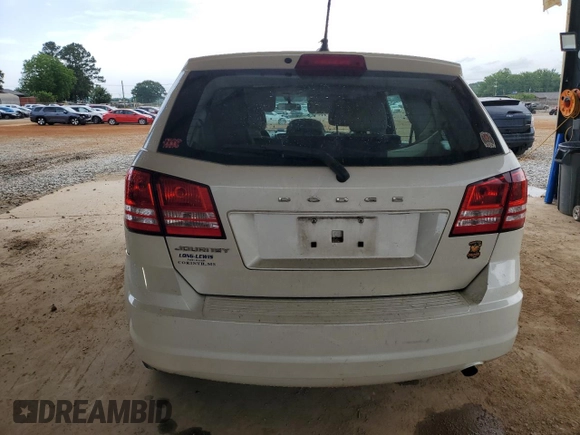 2013 Dodge Journey American Value with VIN 3C4PDCAB5DT656997, listed as a Copart auction lot 57123565 with 201,799 mi miles and Salvage title. Bid and sale history available at DreamBid. Image 6.