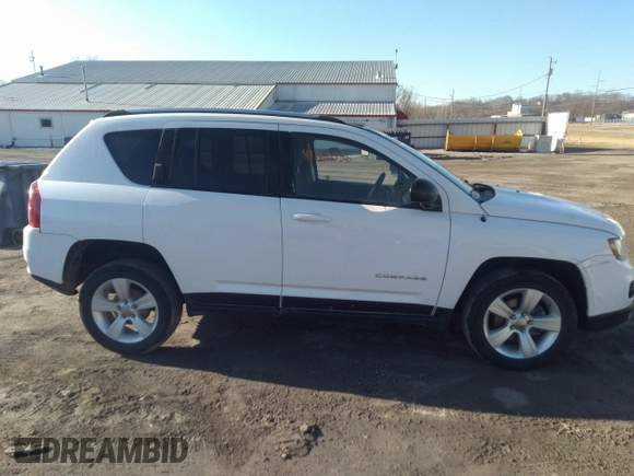 2014 Jeep Compass Sport with VIN 1C4NJCBB7ED508470, listed as a IAAI auction lot 41760536 with 133,628 mi miles and . Bid and sale history available at DreamBid. Image 13.
