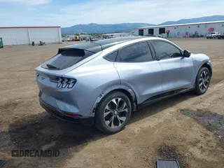 2022 Ford Mustang Mach-E Premium z VIN 3FMTK3SS7NMA02299, wystawiony jako IAAI lot #42238270 z przebiegiem 50 996 mil mil oraz . Historia ofert i sprzedaży dostępna na DreamBid. Obrazek 4.