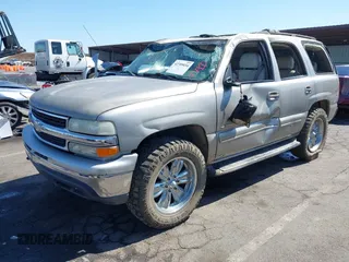 2001 Chevrolet Tahoe LS with VIN 1GNEC13T41J140922, listed as a IAAI auction lot 42709034 with 158,221 mi miles and . Bid and sale history available at DreamBid. Image 2.