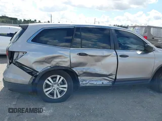 2016 Honda Pilot LX with VIN 5FNYF6H1XGB099987, listed as a IAAI auction lot 41556979 with 98,373 mi miles. Bid and sale history available at carsss.com. Image 6.