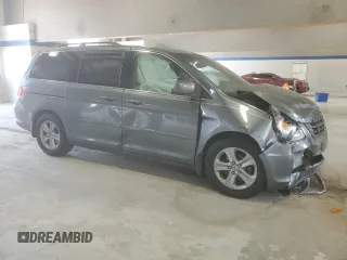 2010 Honda Odyssey Touring with VIN 5FNRL3H91AB113770, listed as a Copart auction lot 61893115 with 155,776 mi miles and Salvage title. Bid and sale history available at DreamBid. Image 4.