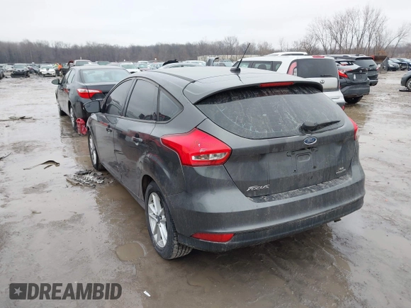 2015 Ford Focus SE with VIN 1FADP3K26FL383355, listed as a IAAI auction lot 41520459 with 142,111 mi miles and . Bid and sale history available at DreamBid. Image 3.