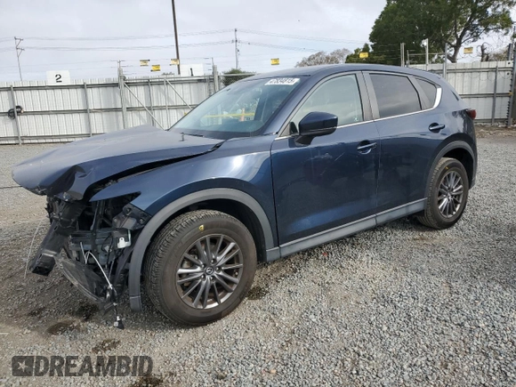 2021 Mazda CX-5 Touring with VIN JM3KFACM1M0313910, listed as a Copart auction lot 47834815 with 40,671 mi miles and Salvage Title. Bid and sale history available at carsss.com. Image 1.