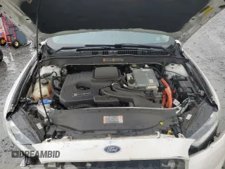 2013 Ford Fusion SE Hybrid with VIN 3FA6P0LU1DR358983, listed as a Copart auction lot 51907665 with 143,459 mi miles and Salvage Title. Bid and sale history available at DreamBid. Image 11.