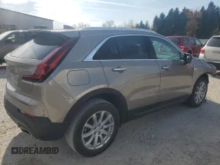 2022 Cadillac XT4 FWD Luxury with VIN 1GYAZAR4XNF121008, listed as a Copart auction lot 77599974 with 29,141 mi miles and Salvage title. Bid and sale history available at DreamBid. Image 3.