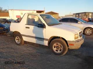 2000 Chevrolet Tracker z VIN 2CNBE18C3Y6920718, wystawiony jako IAAI lot #41566833 z przebiegiem 157 316 mil mil oraz . Historia ofert i sprzedaży dostępna na DreamBid. Obrazek 1.