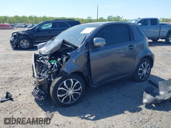 2012 Scion iQ z VIN JTNJJXB0XCJ013923, wystawiony jako IAAI lot #42109295 z przebiegiem 119 937 mil mil oraz . Historia ofert i sprzedaży dostępna na DreamBid. Obrazek 17.