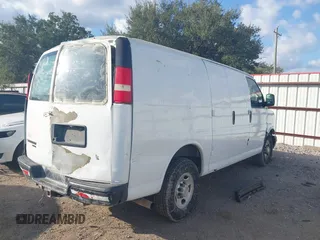2013 Chevrolet Express Cargo with VIN 1GCWGFBA6D1185850, listed as a IAAI auction lot 40965967 with 165,641 mi miles and . Bid and sale history available at DreamBid. Image 4.