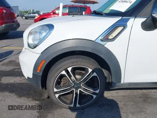 2012 MINI Countryman S with VIN WMWZC3C56CWL82122, listed as a IAAI auction lot 42600474 with 71,920 mi miles and . Bid and sale history available at DreamBid. Image 12.