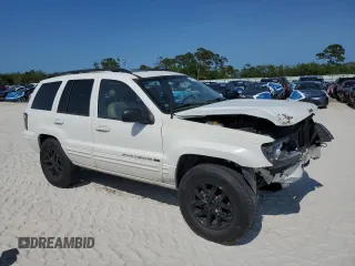 2002 Jeep Grand Cherokee Limited with VIN 1J4GX58S52C121941, listed as a Copart auction lot 55472015 with 182,225 mi miles and Salvage Title. Bid and sale history available at DreamBid. Image 4.