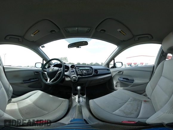 2010 Honda Insight EX with VIN JHMZE2H74AS040110, listed as a IAAI auction lot 42643669 with 189,531 mi miles and . Bid and sale history available at DreamBid. Image 18.