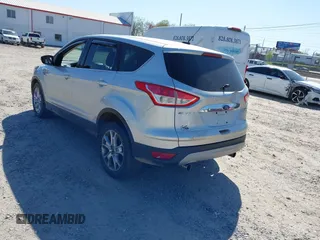 2013 Ford Escape SEL with VIN 1FMCU9H94DUA25017, listed as a IAAI auction lot 41976238 with 171,885 mi miles and . Bid and sale history available at DreamBid. Image 3.