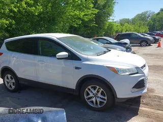 2016 Ford Escape SE z VIN 1FMCU9GX1GUC67851, wystawiony jako IAAI lot #42283011 z przebiegiem 134 458 mil mil oraz . Historia ofert i sprzedaży dostępna na DreamBid. Obrazek 13.