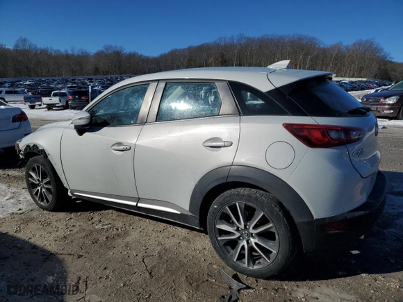 2016 Mazda CX-3 Grand Touring with VIN JM1DKBD79G0112692, listed as a Copart auction lot 89339235 with 164,861 mi miles and Salvage Title. Bid and sale history available at carsss.com. Image 2.