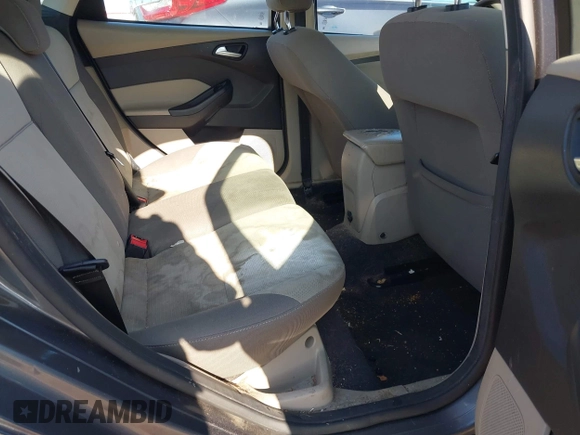 2012 Ford Focus SE z VIN 1FAHP3K23CL366865, wystawiony jako IAAI lot #42140894 z przebiegiem 168 754 mil mil oraz . Historia ofert i sprzedaży dostępna na DreamBid. Obrazek 8.