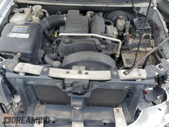 2005 GMC Envoy SLT with VIN 1GKDS13S652330496, listed as a Copart auction lot 73317234 with 191,138 mi miles and Salvage Title. Bid and sale history available at DreamBid. Image 13.