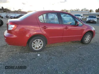 2013 Suzuki SX4 LE with VIN JS2YC5A37D6101819, listed as a Copart auction lot 82367044 with 142,932 mi miles and Salvage Title. Bid and sale history available at carsss.com. Image 3.