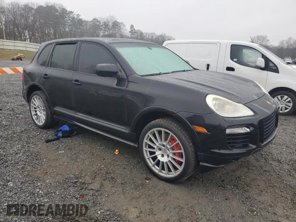 2009 Porsche Cayenne Turbo with VIN WP1AC29P69LA83418, listed as a Copart auction lot 87115384 with 129,437 mi miles and Clean Title. Bid and sale history available at carsss.com. Image 4.