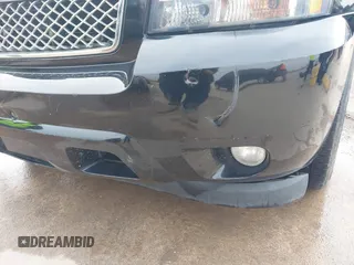 2014 Chevrolet Tahoe LTZ z VIN 1GNSCCE04ER141920, wystawiony jako IAAI lot #41484239 z przebiegiem 98 855 mil mil oraz . Historia ofert i sprzedaży dostępna na DreamBid. Obrazek 6.