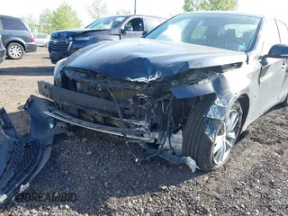 2014 Infiniti Q50 Sport with VIN JN1BV7AR4EM695845, listed as a IAAI auction lot 42147456 with 152,473 mi miles and . Bid and sale history available at DreamBid. Image 6.