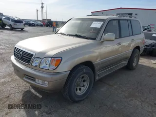 2000 Lexus LX 470 with VIN JT6HT00W0Y0098917, listed as a IAAI auction lot 41937661 with 180,980 mi miles and . Bid and sale history available at DreamBid. Image 17.