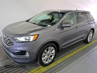 2021 Ford Edge Titanium z VIN 2FMPK3K92MBA53689, wystawiony jako IAAI lot #42501151 z przebiegiem 93 941 mil mil oraz . Historia ofert i sprzedaży dostępna na DreamBid. Obrazek 9.