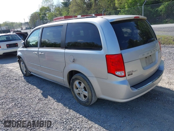 2012 Dodge Grand Caravan SXT with VIN 2C4RDGCG0CR284124, listed as a IAAI auction lot 42103224 with 131,691 mi miles and . Bid and sale history available at DreamBid. Image 3.