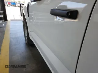 2022 Ford F-150 XL with VIN 1FTEX1EB9NKD05557, listed as a IAAI auction lot 42677706 with 128,260 mi miles and . Bid and sale history available at DreamBid. Image 1.