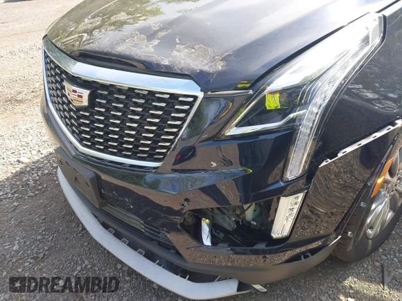2021 Cadillac XT5 AWD Premium Luxury z VIN 1GYKNDRS8MZ217572, wystawiony jako IAAI lot #42190571 z przebiegiem 25 100 mil mil oraz . Historia ofert i sprzedaży dostępna na DreamBid. Obrazek 6.