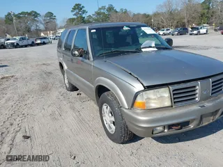 2000 Oldsmobile Bravada with VIN 1GHDT13W3Y2231550, listed as a IAAI auction lot 41518286 with 313,805 mi miles. Bid and sale history available at carsss.com. Image 1.