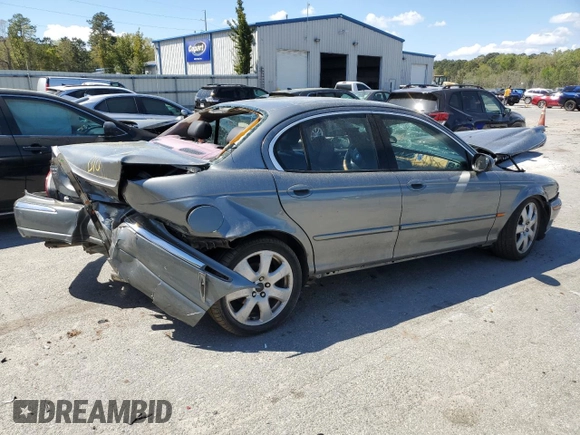 2004 Jaguar X-Type with VIN SAJEA51C04WD91344, listed as a Copart auction lot 49979285 with Not Provided miles and Salvage Title. Bid and sale history available at DreamBid. Image 3.