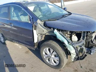 2014 Honda CR-V EX-L with VIN 2HKRM4H74EH607257, listed as a IAAI auction lot 41801147 with 67,145 mi miles. Bid and sale history available at carsss.com. Image 18.